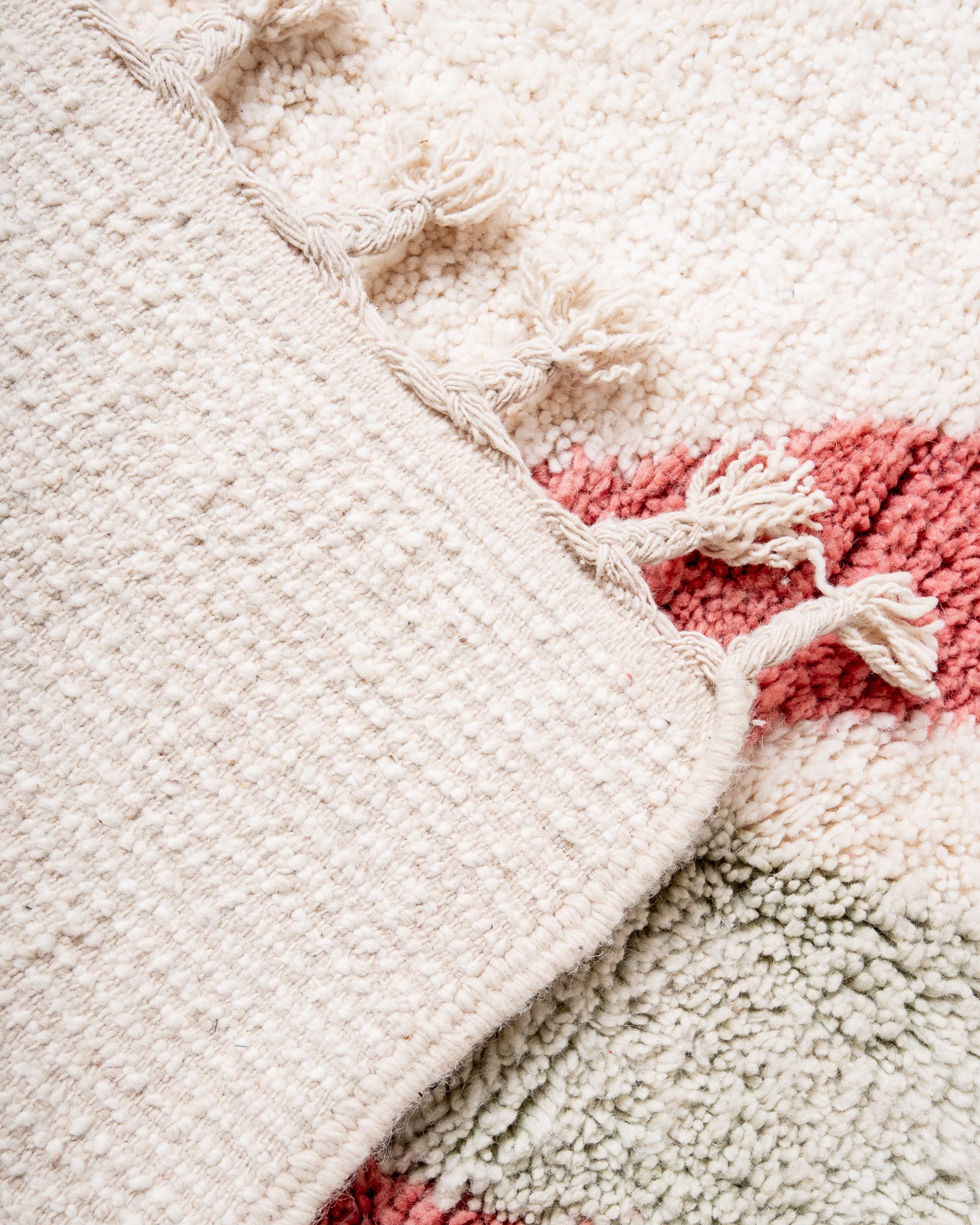 Modern, designer, handcrafted Berber rug from Morocco. Beniourain carpet with beautiful colours and patterns and fluffy wool texture.